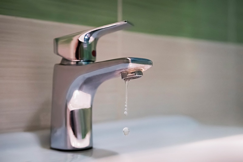 5 plumbing problems costing you money. Dripping faucet.